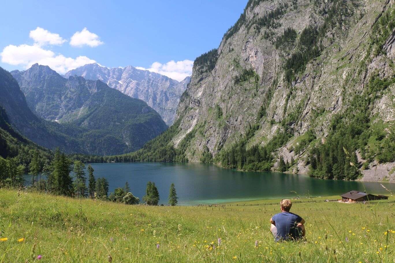 Man sitting and looking at Obersee in Baravia